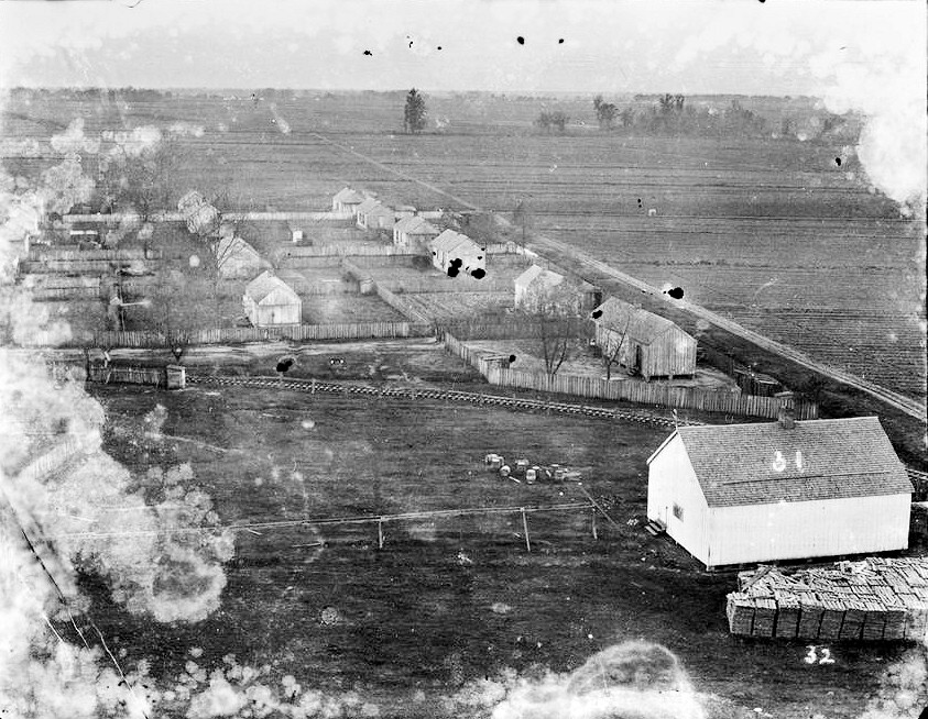 Laurel Valley Sugar Plantation, Thibodaux Louisiana Taken from top of water tower looking SW showing cooperage shed and row of workers houses 1906