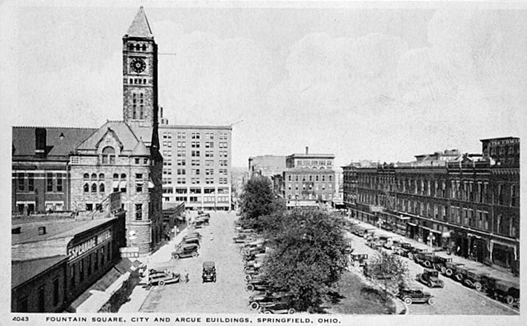 Arcade Hotel, Springfield Ohio Postcard (from the Clark County Historical Society, Springfield, Ohio, no date) FOUNTAIN SQUARE AND ARCUE (ARCADE) BUILDINGS, VIEW NORTH, ARCADE ON EAST SIDE OF FOUNTAIN SQUARE