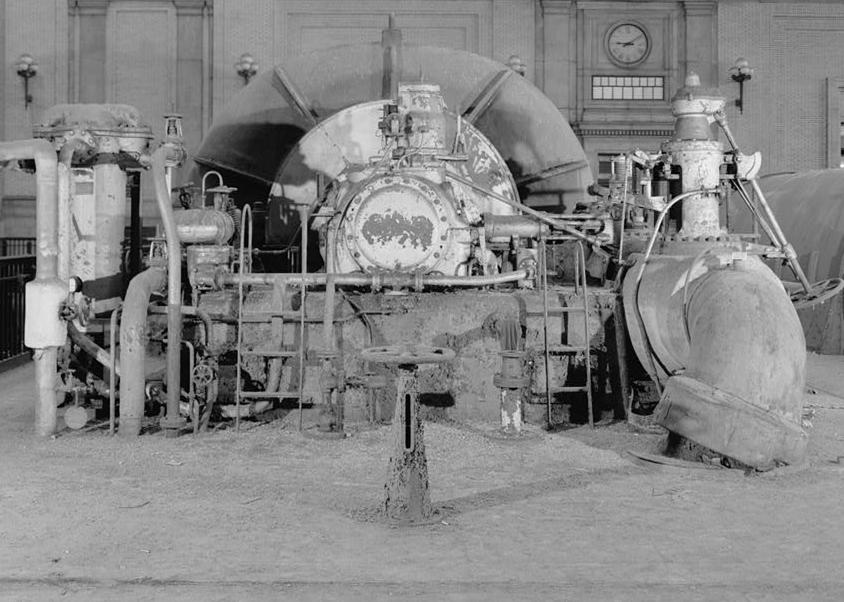 Chester Electric Power Station - PECO Energy, Chester Pennsylvania 1997 TURBINE HALL, LOOKING NORTH AT THE REAR OF UNIT 2, SHOWING STEAM PIPE, QUICK STOP VALVE, GOVERNOR, AND OIL COOLER; ALSO SHOWING UNIT 5 TO RIGHT (SEE DRAWING No. 12 OF 13)