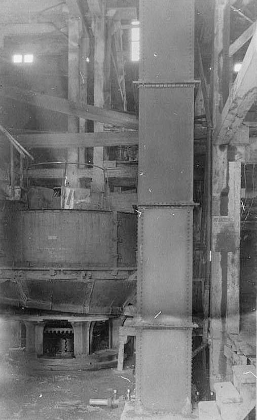 Bald Mountain Gold Mill, Lead South Dakota TROJAN MILL, INTERIOR SHOWING PRIMARY MILL No. 1 (MONADNOCK CHILEAN) FROM EAST, c. 1912. ELEVATOR No. 1 ADJACENT TO MILL.