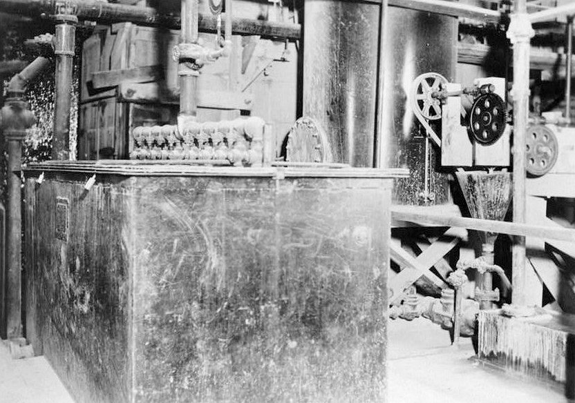 Bald Mountain Gold Mill, Lead South Dakota BALD MOUNTAIN MILL, INTERIOR SHOWING PRECIPITATION AREA FROM NORTH, c. 1934. SHOWS PRECIPITATION TANK No. 1 (NOTE LOCKS), ZINC FEEDER WITH MIXING CONE, VACUUM RECEIVER AND PIPING