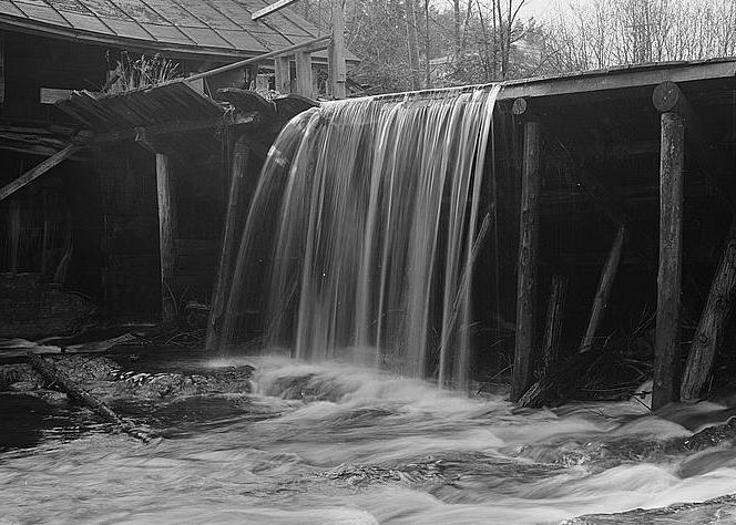 Ben Thresher's Mill, Barnet Vermont 1979 View looking west at rear of Cider Mill and SW end of dam. Details of dam construction.