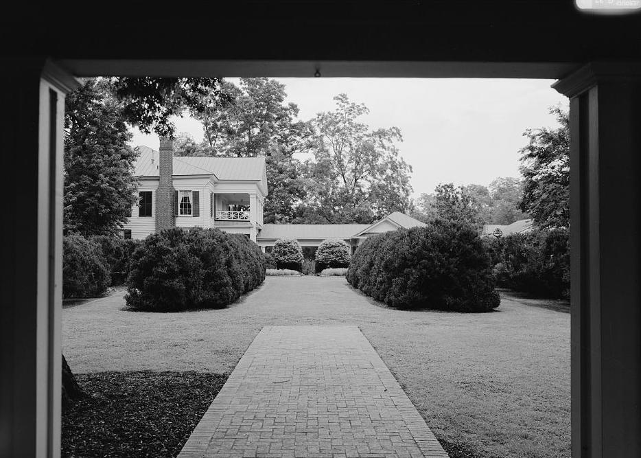 Arlington Place - Munger Mansion, Birmingham Alabama 1997 VIEW OF COVERED WALKWAY LEADING FROM SOUTH PORCH TO THE MUSEUM OFFICE & EMPLOYEE DINING ROOM, LOOKING FROM THE PERGOLA AT THE WEST END OF THE FORMAL GARDEN (NOTE THE DINING ROOM WAS BUILT AS THE GARAGE)