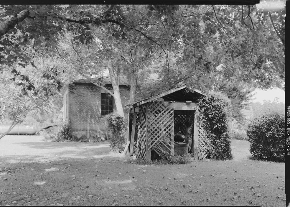 Kenworthy Hall - Carlisle-Martin House, Marion Alabama  VIEW LOOKING WEST TO EAST THAT HIGHLIGHTS THE WELL SHED AND KITCHEN STRUCTURES