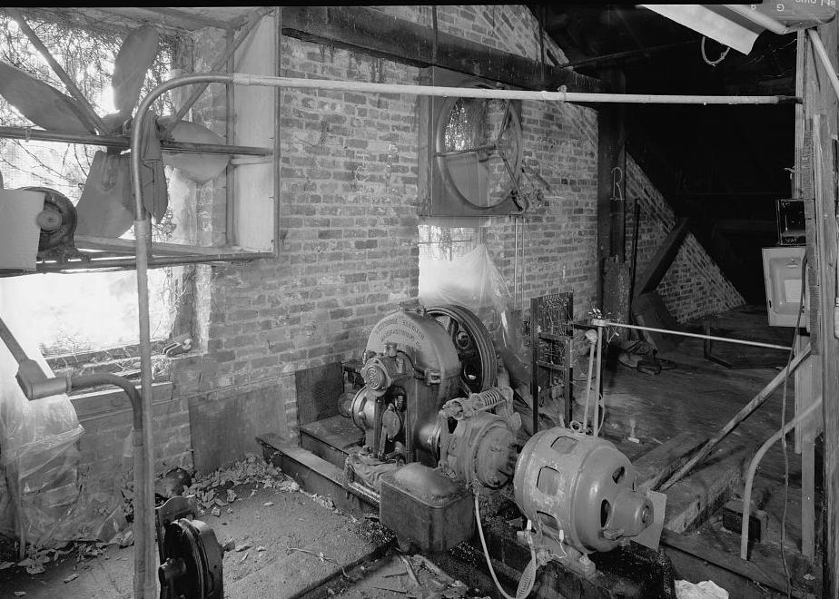 Prattville Manufacturing Company - Cotton Mill, Prattville Alabama ATTIC, MILL NO 1, SHOWING WESTBROOK ELEVATOR MACHINERY AT SOUTH END (1998)
