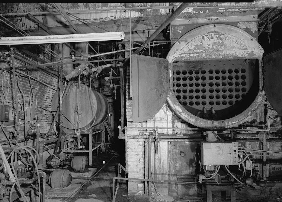 Prattville Manufacturing Company - Cotton Mill, Prattville Alabama BOILER ROOM. SMALL BOILER ON LEFT OF UNKNOWN MANUFACTURE, WITH INDUCTION MOTORS. HARTLEY BOILER, MONTGOMERY, ALABAMA, ON RIGHT (1998)