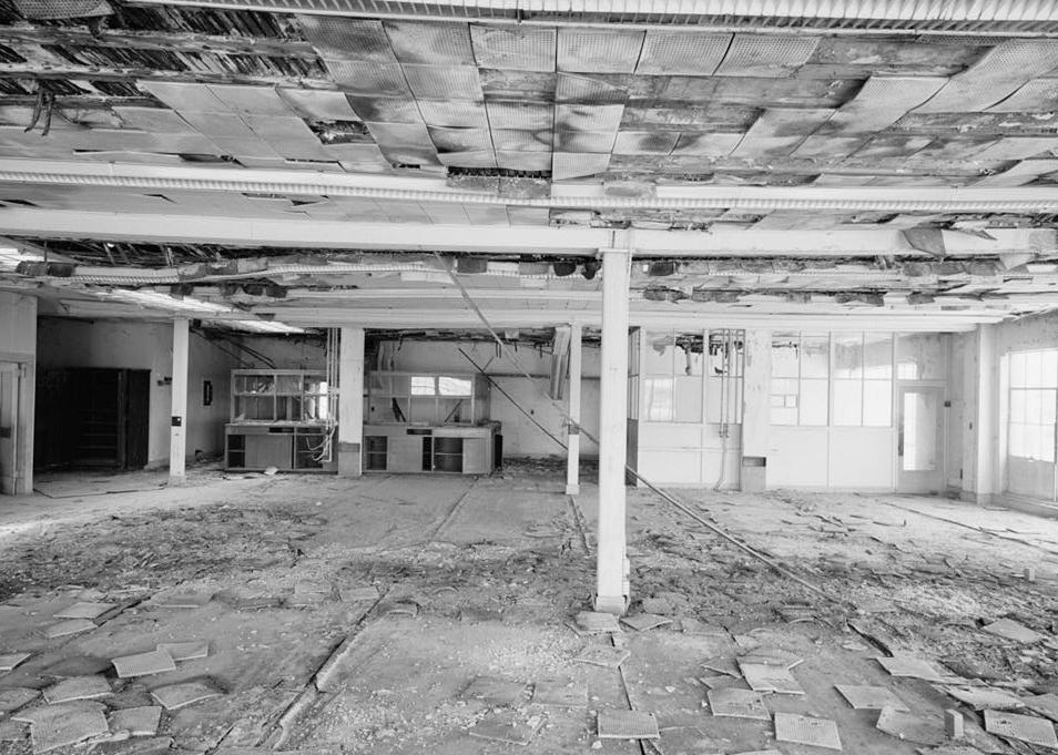Southern Pacific Train Station Post Office, Sacramento California 1994 View of large workroom on southwest corner of second floor interior, American Railway Express Building, looking to the east. View shows corner office, boxed wood ceiling beams and wood support posts