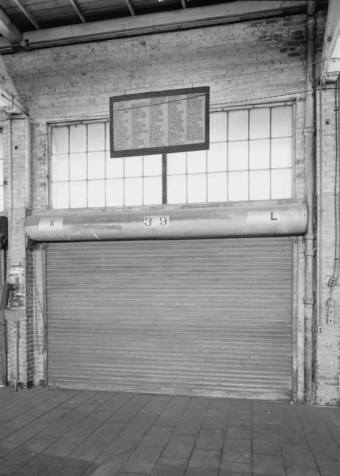 Southern Pacific Train Station Post Office, Sacramento California 1994 View of interior of loading dock, main floor, showing detail of metal roll-up door. View is to south