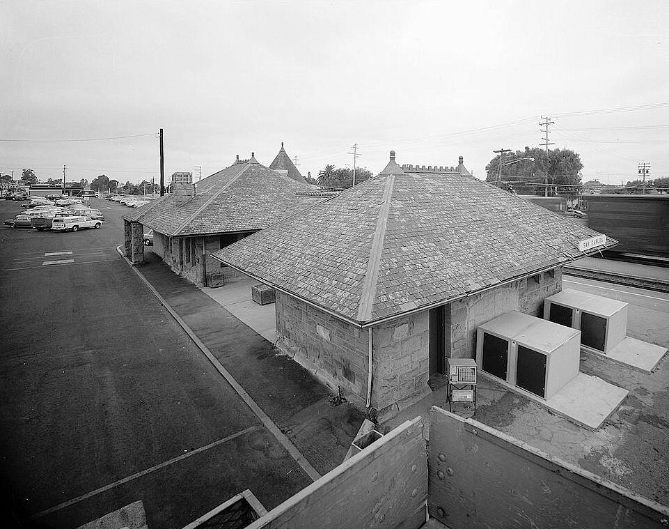 Southern Pacific Railroad Train Depot, San Carlos California 1984 Slate roof and chimney, bicycle lockers placed against southeast wall; view to north