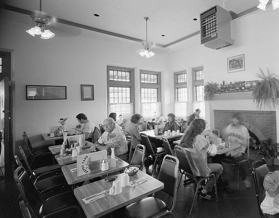 Southern Pacific Railroad Train Depot, San Carlos California 1984 Interior of former waiting room, now used as restaurant; only remaining original fixtures are windows and Romanesque-arched fireplace, the latter uncovered during removal of railroad-placed drywall by restaurant owner; view to south