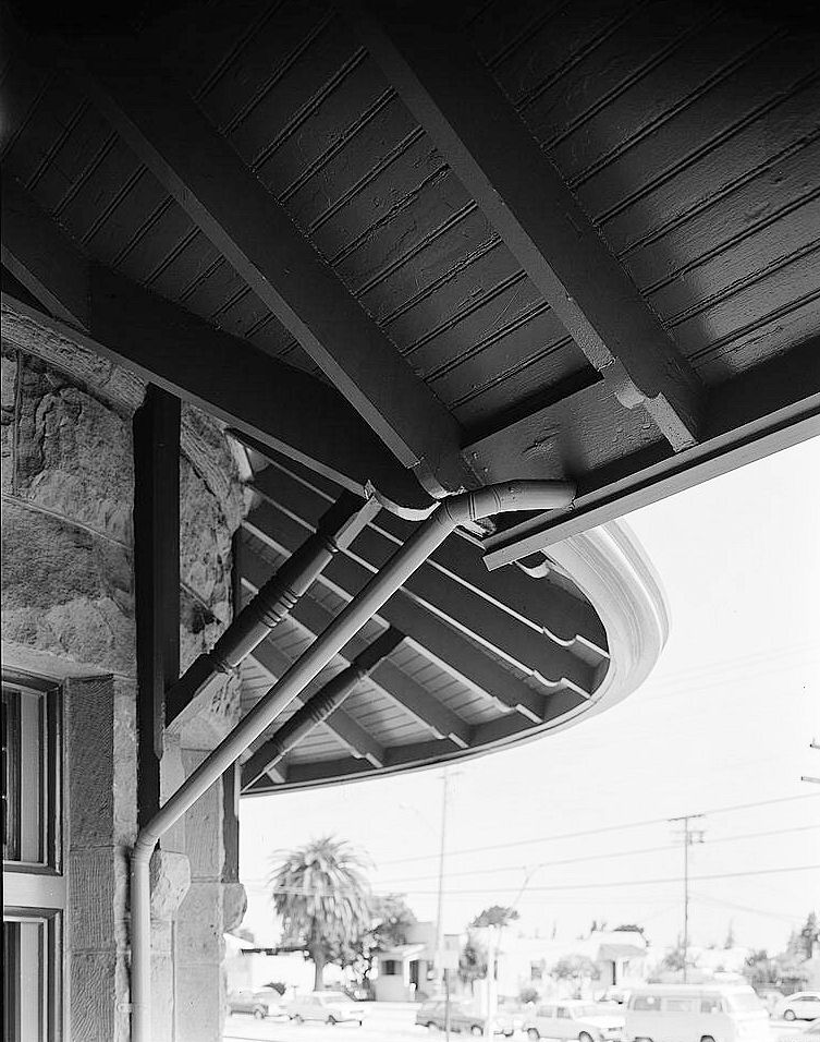 Southern Pacific Railroad Train Depot, San Carlos California 1987 Detail, northeast facade, repaired tower skirt roof, knee braces, downspout, view to north-northwest