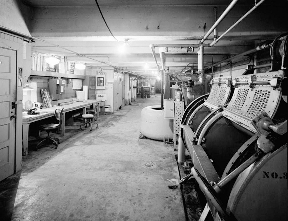 Fleishhacker Pool and Bath House, San Francisco California 1979 VIEW OF BATH HOUSE BASEMENT, LAUNDERING EQUIPMENT SHOWN IN FOREGROUND