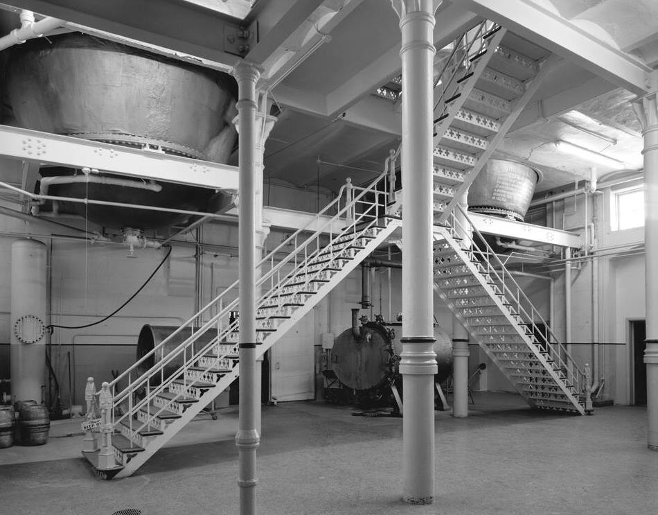 Tivoli-Union Brewery (Milwaukee Brewery), Denver Colorado Tower Building interior. First view of plant behind offices Equipment and double iron steps to 2<sup>nd</sup> floor. Beer parties were also held here. 