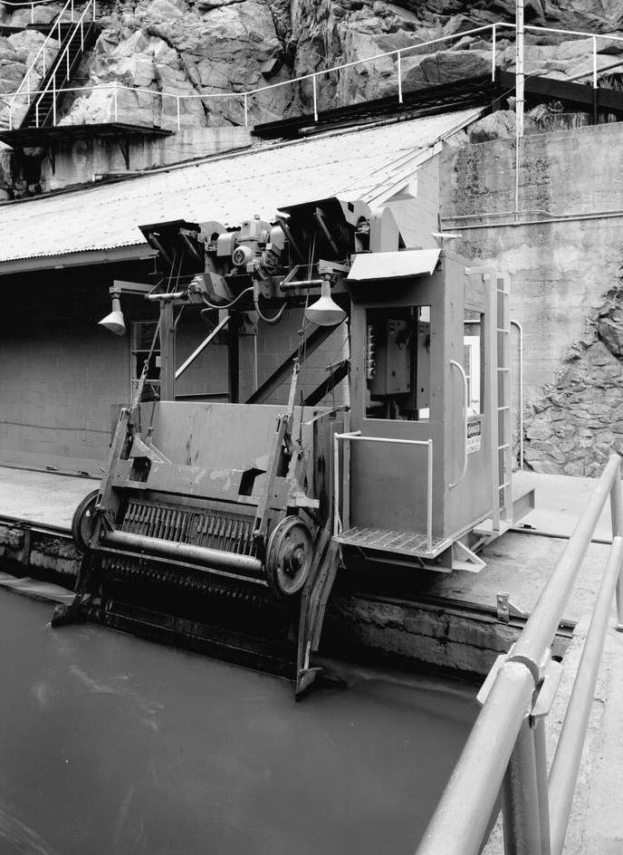 Shoshone Hydroelectric Plant Complex, Glenwood Canyon Colorado Detail of trash rake, for removing debris from the entrance to the diversion tunnel, gate house in background, view to the west