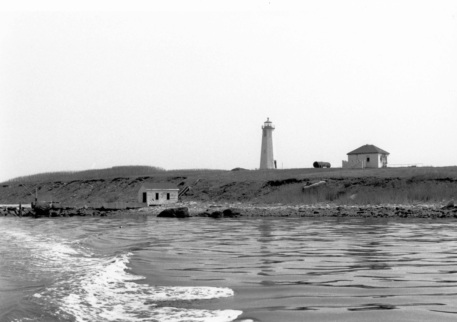 Falkner's Island Lighthouse, Falkner Island Connecticut Dock, boathouse, lighthouse, and powerhouse, camera facing northeast (1989)