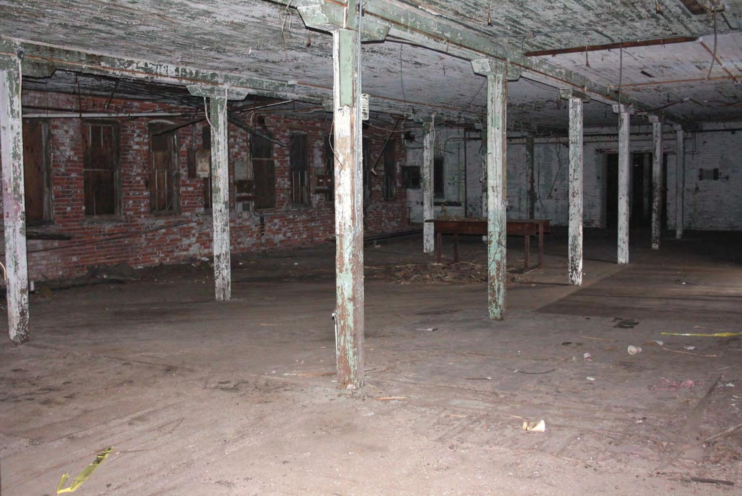 New Haven Clock Company Factory, New Haven Connecticut Interior, Building No. 1, showing mill construction with center line of square chamfered   wooden columns, heavy transverse beam, and solid plank floors (2016)
