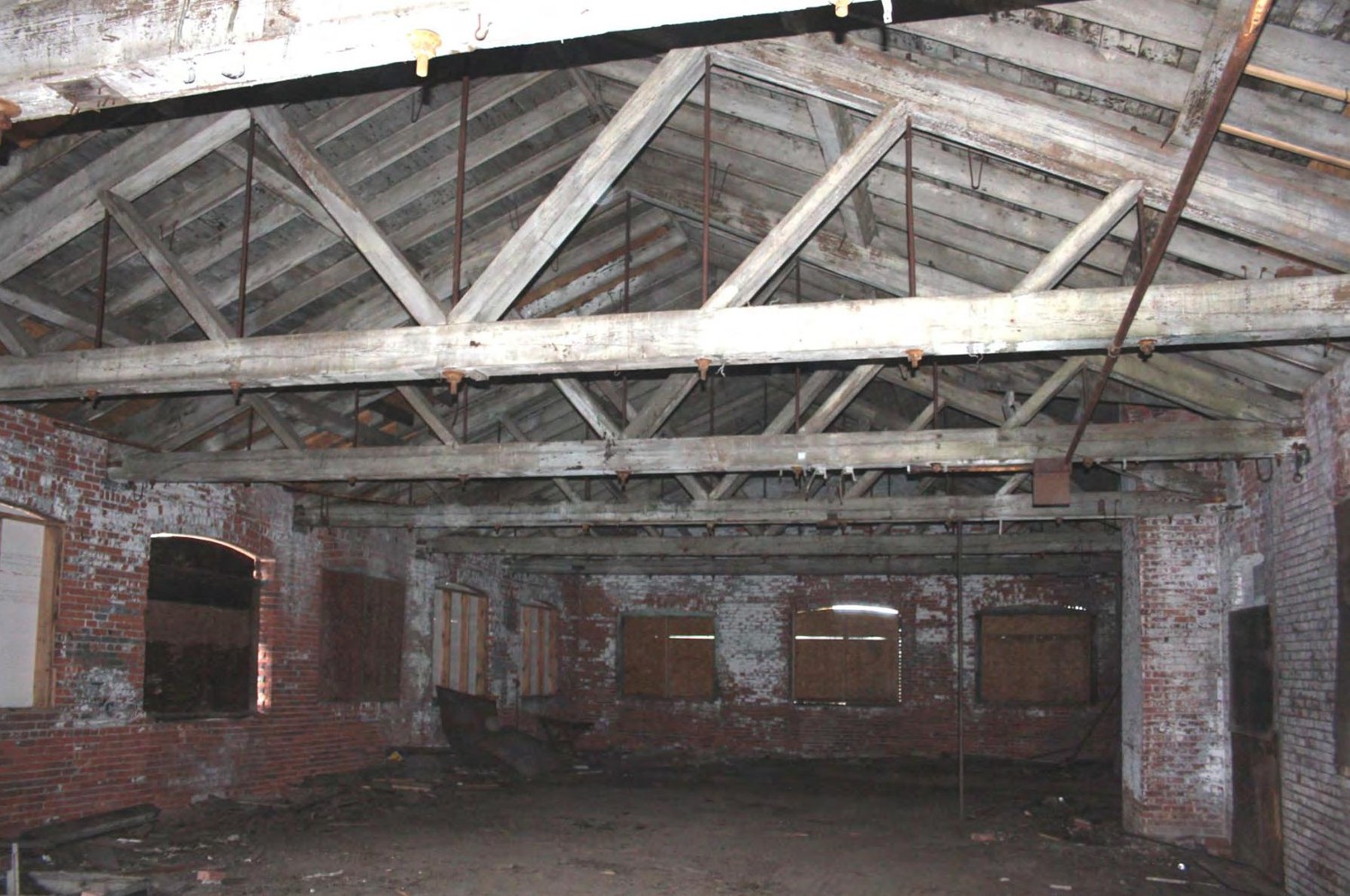 New Haven Clock Company Factory, New Haven Connecticut Interior, Building No. 10, showing joists visible above break in tongue-and-groove ceiling (2016)