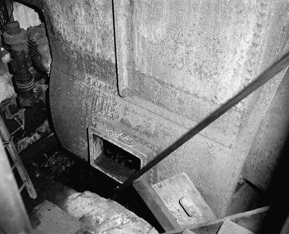 Willimantic Linen Company Mill Number 2, Windham Connecticut 1988 DETAIL VIEW WEST OF MIDDLE TURBINE PRESSURE CASE; ACCESS TO WICKET GATES AT BOTTOM