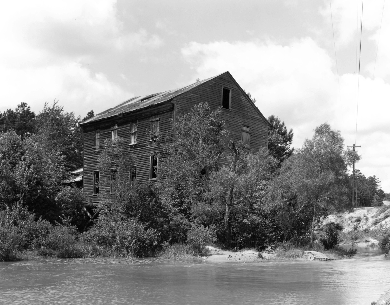 Myrick's Mill, Fitzpatrick Georgia View of north and east facades of Myrick's Mill across Big Sandy Creek (1975)