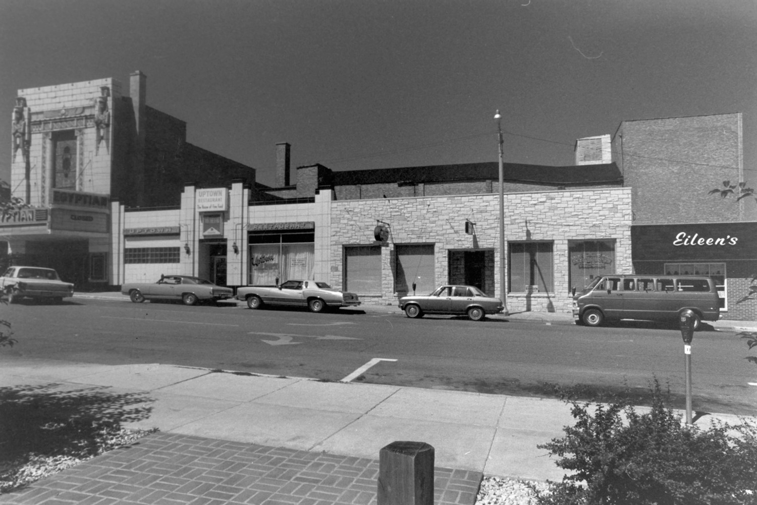 Egyptian Theatre, DeKalb Illinois L-shaped structure extends behind shops on Second Street. Original plan for shops and hotel to be built to complete the block had to be abandoned in 1929. (1978)