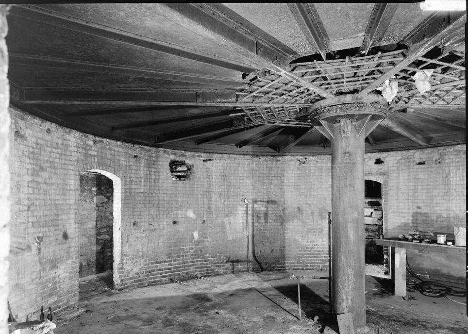 Montgomery County Jail, Crawfordsville Indiana 1974 VIEW OF CIRCULAR ROOM IN CELLAR SHOWING STEEL SUPPORT STRUCTURE FOR ROTATING CELL BLOCKS