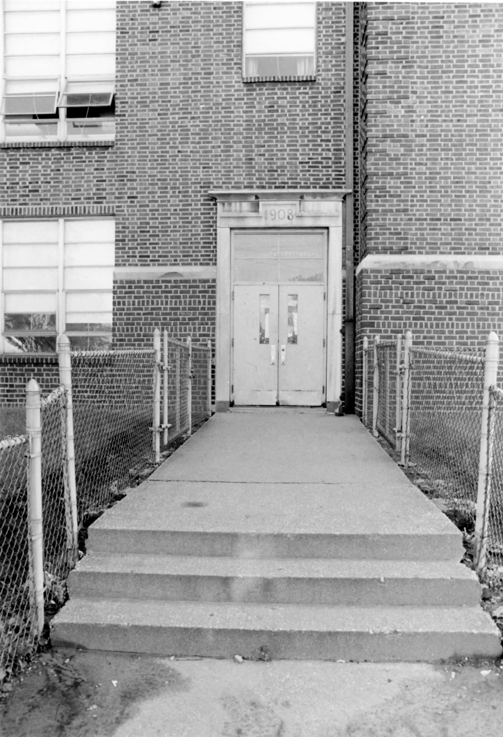 Ralph Waldo Emerson School, Gary Indiana Southwest entrance showing date of construction, camera facing north (1993)