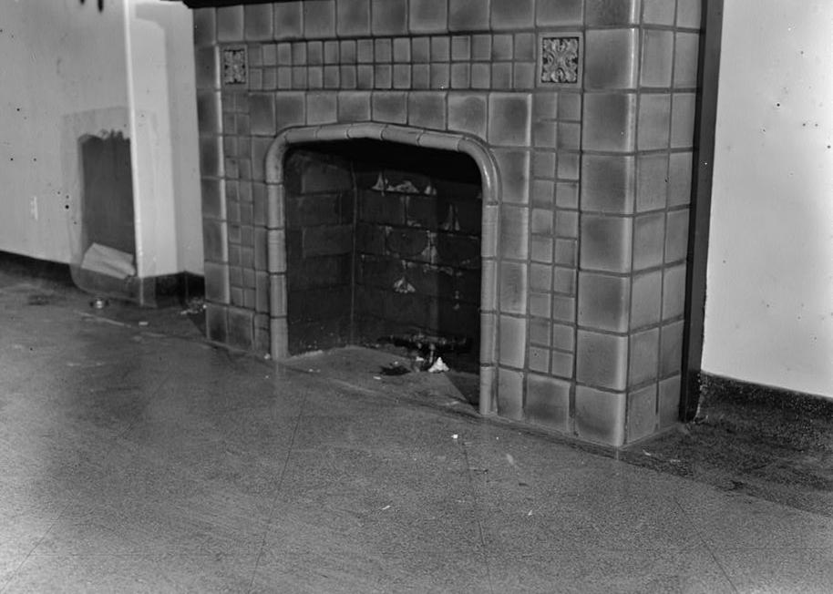 John T. Beasley Building - Citizens Gas & Fuel Company, Terre Haute Indiana 1993  Detail. A view of the glazed tile fireplace which was installed into the east wall of the building at an unknown date (it does not appear on the drawings).