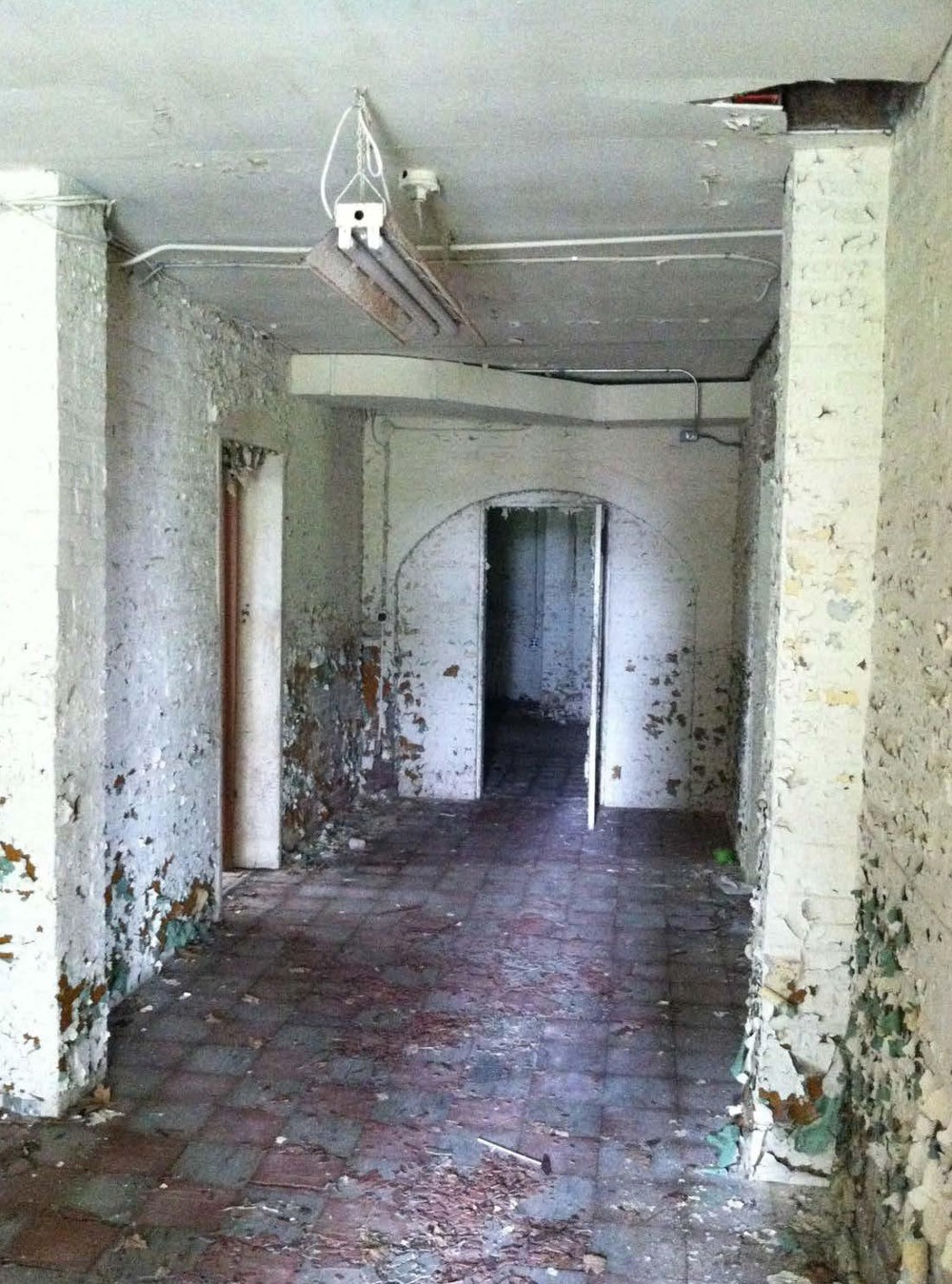 Knox County Poor Asylum, Vincennes Indiana View of main corridor in basement of southeast (men's) wing (2016)