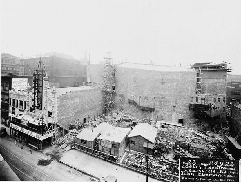Loews Theater History, Louisville Kentucky LOOKING EAST, BRICK WALL VENEER AND PART OF ENTRANCE FACADE IN PLACE, February 29, 1928