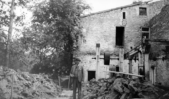 Labrot and Grahams Oscar Pepper - Old Crow - Distillery, Versailles Kentucky 1934 Distillery building interior, rear part looking south. Rear wall has been taken down and is being rebuilt.