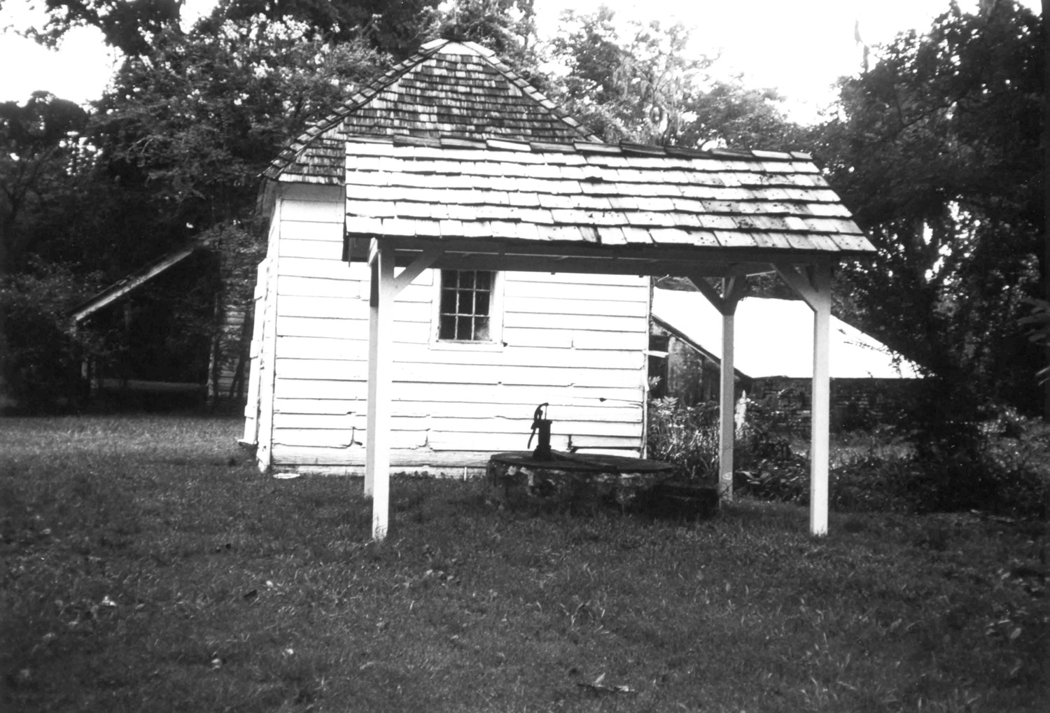 Cottage Plantation, St. Francisville Louisiana Cistern shed:  roof supported by corner posts 10ft square (1973)