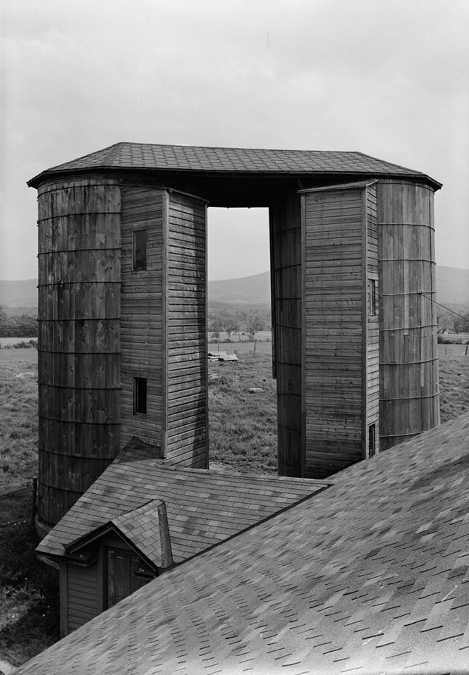 Shaker Church Family Round Barn, Hancock Massachusetts June 1962 WOODEN SILOS AT SOUTHERN END OF SOUTH WING