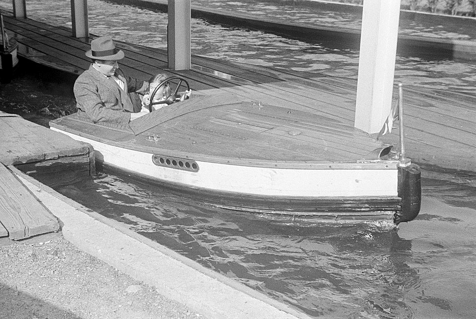 Glen Echo Amusement Park, Glen Echo Maryland A man and a little girl taking a ride in a motor boat at Glen Echo Park (1939)
