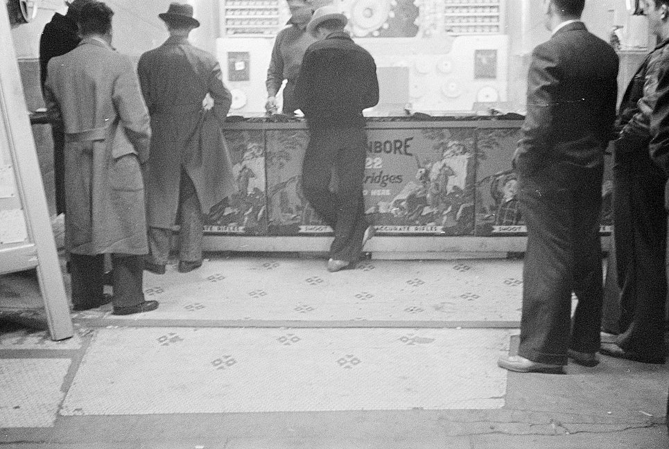 Glen Echo Amusement Park, Glen Echo Maryland Some young men enjoying themselves in a shooting gallery (1939)