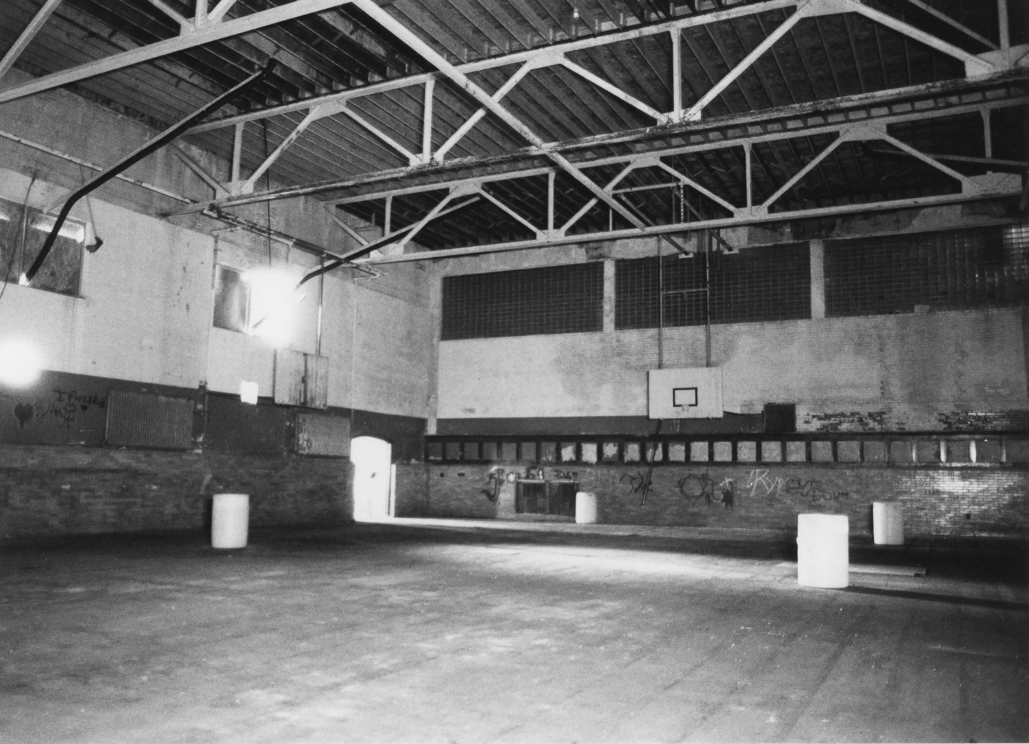 Boys Club Building, Battle Creek Michigan Gymnasium, looking northwest. Lower wall finish is glazed orange brick. Note decorative half-timbering on far wall (2001)