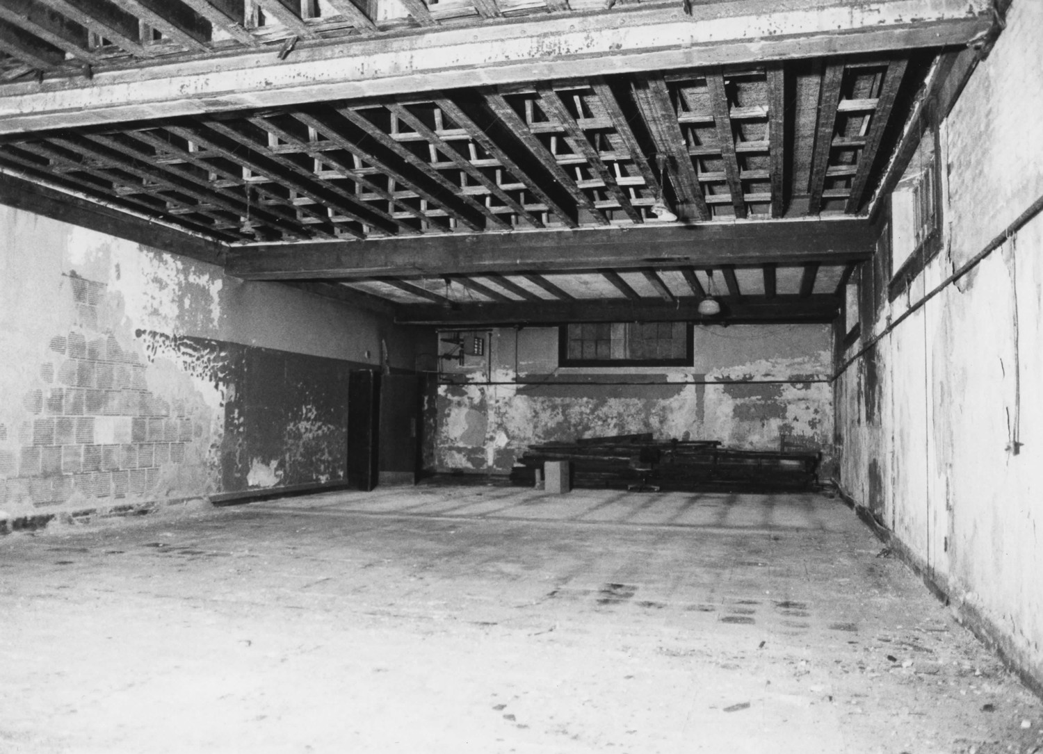 Boys Club Building, Battle Creek Michigan Banquet room in basement, looking southeast. Note half-timbered ceiling treatment, original wood trim, and metal sash hopper windows (2001)