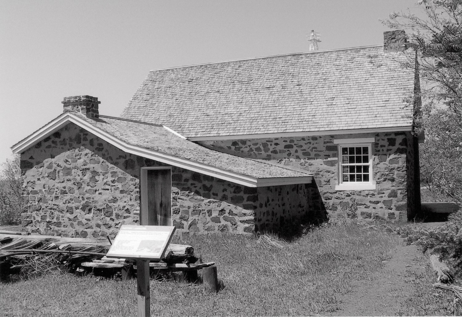 Copper Harbor Light Station, Copper Harbor Michigan 1848 keeper's dwelling, east elevation (left) has the door & north elevation (right) (2009)