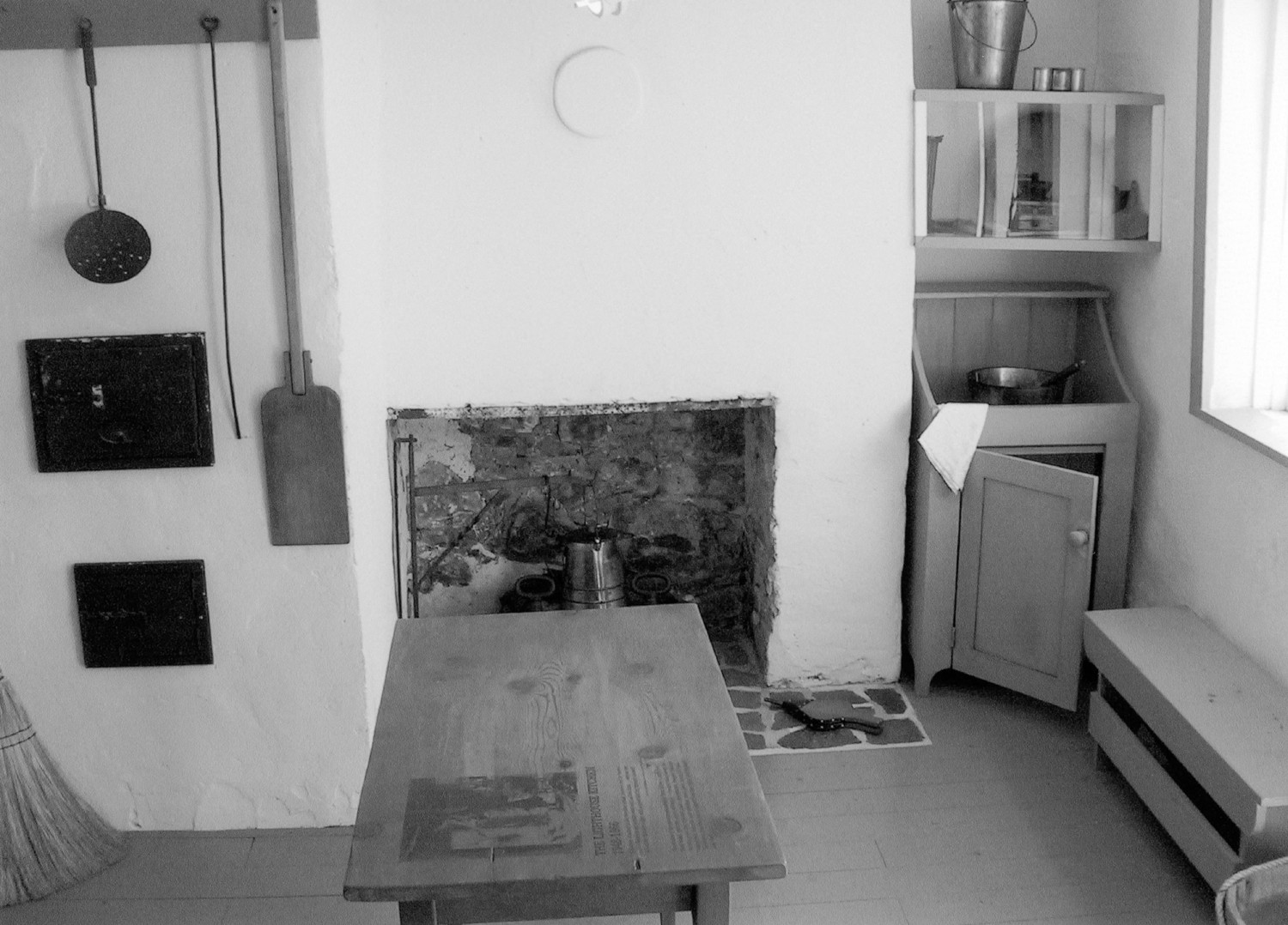 Copper Harbor Light Station, Copper Harbor Michigan 1848 keeper's dwelling, kitchen area with fireplace and wood floor (2009)