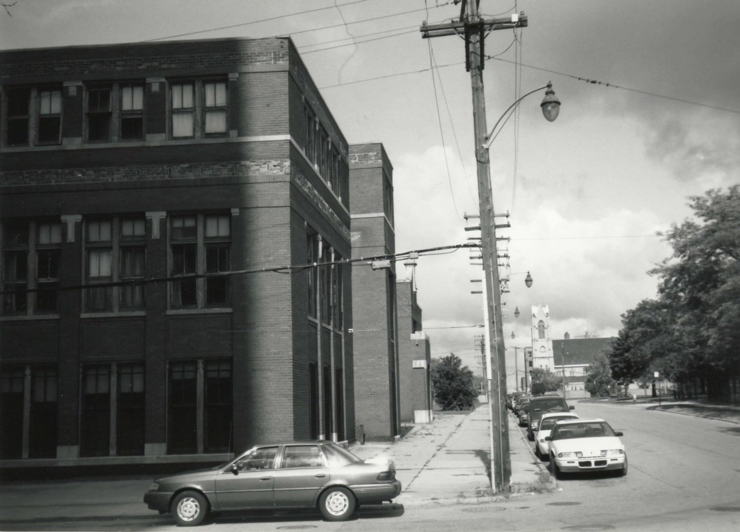 Nellie Leland School, Detroit Michigan Looking north on Antietam Street with east facade on the left and St. John's-St. Luke's Evangelical Church in the background (2001)