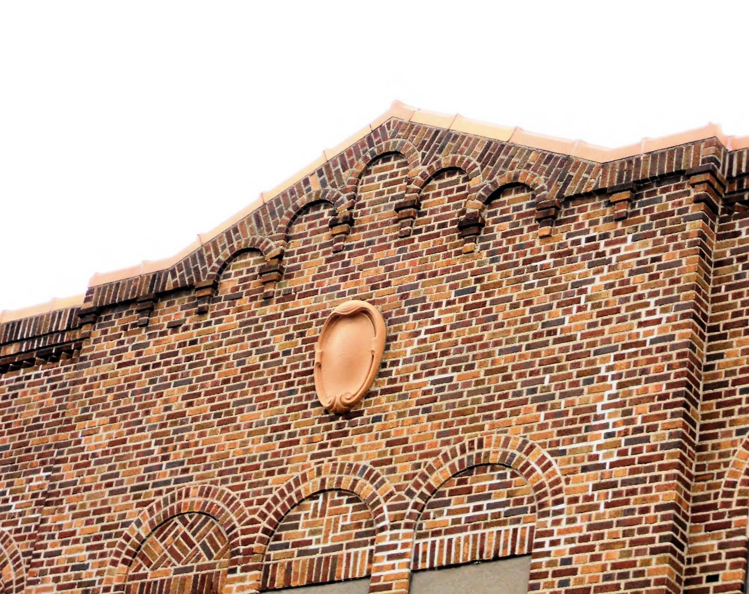 Eastern Avenue School, Grand Rapids Michigan East elevation, masonry detail at pediment marking entry (2012)