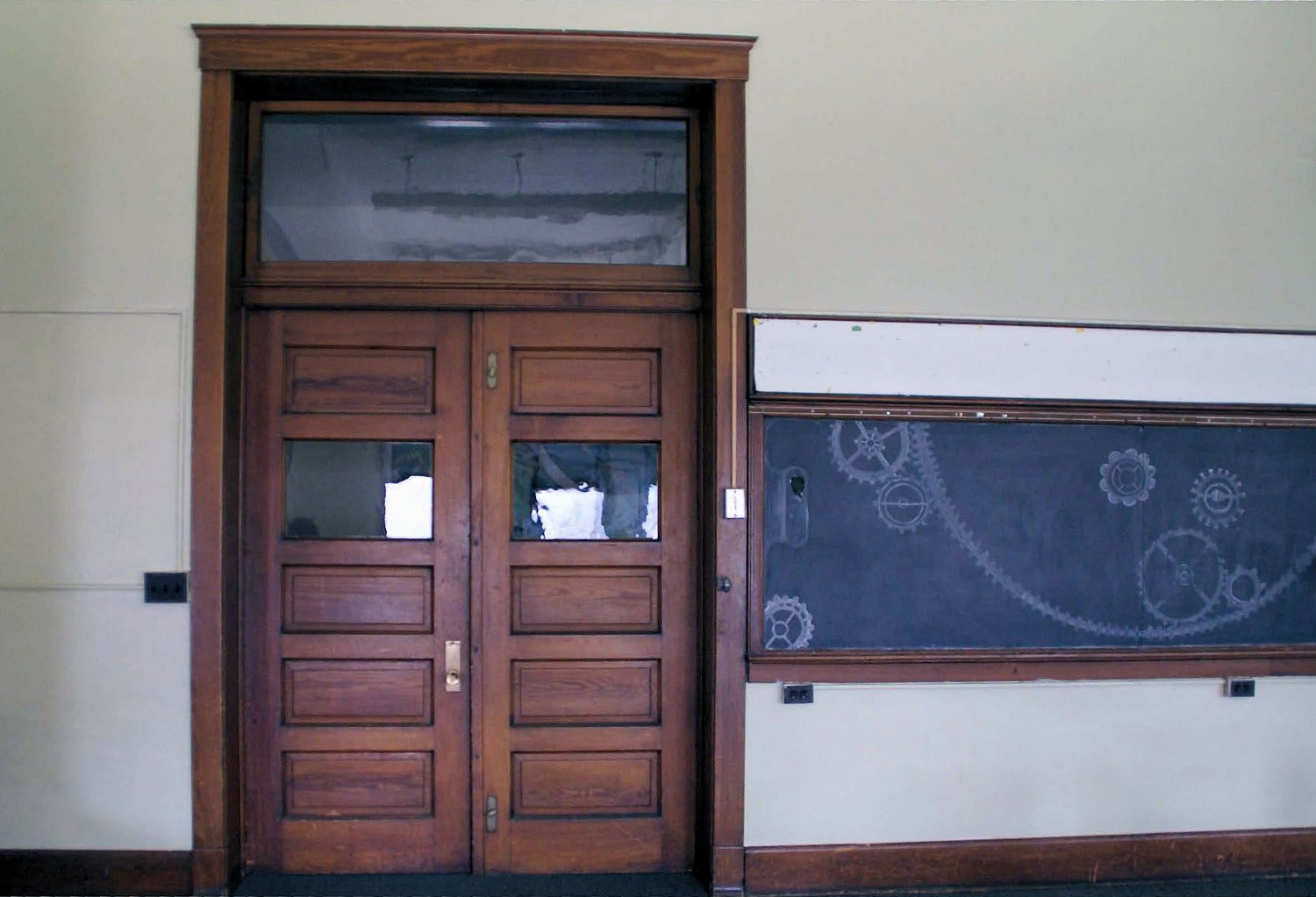Genesee Street School, Lansing Michigan Assembly room, 1912 school, showing blackboards, doors, and transom (2013)