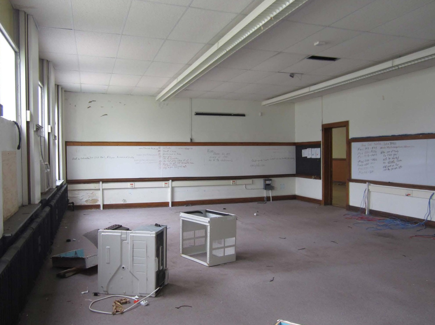 Lincoln School, Owosso Michigan Second floor southwest classroom looking northeast toward corridor and chalkboards/white boards at internal walls (2014)