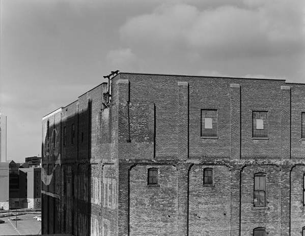 Crown Roller Mill, Minneapolis Minnesota SOUTH AND EAST SIDE, THREE-QUARTER VIEW, DETAIL SHOWING SIXTH-FLOOR BRICK ADDITION AND ORIGINAL BRICK PILASTERS; LOOKING NORTHWEST