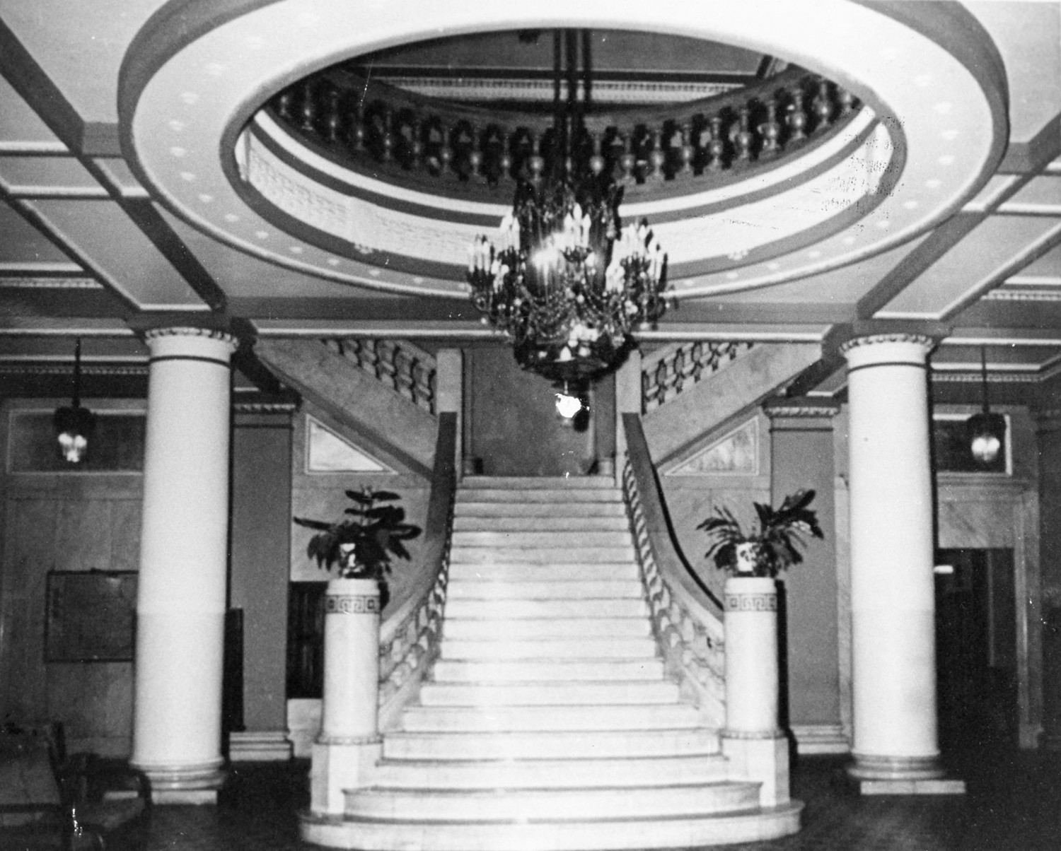 Joplin Connor Hotel, Joplin Missouri Looking west from center of Main Lobby at marble staircase. Stairs lead tocopen mezzanine above. Main desk is at right (not visible). Behind stairs is stairway to basement. East looking west (1965) 