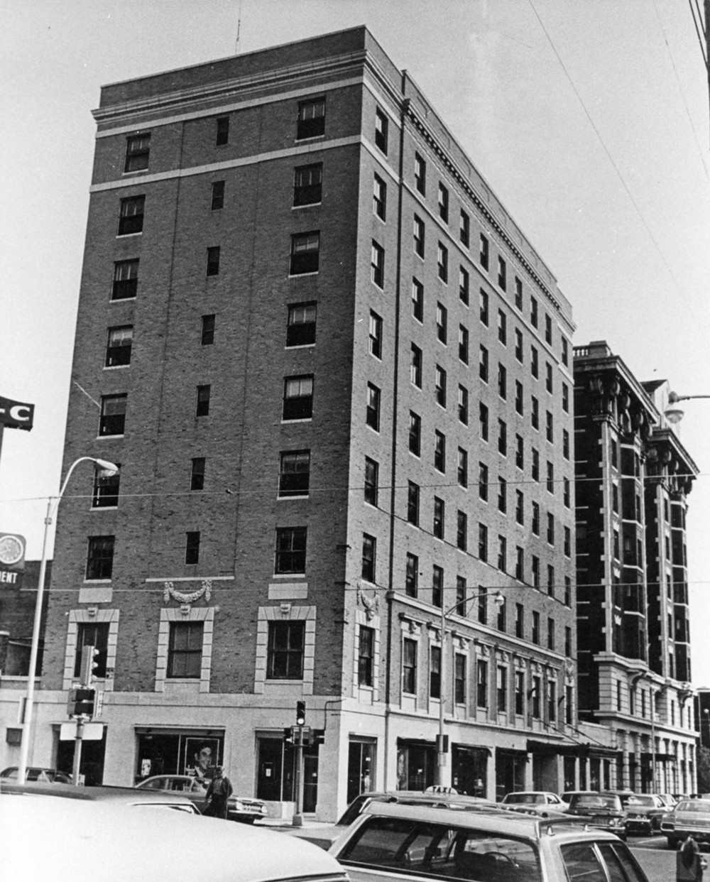 Joplin Connor Hotel, Joplin Missouri West and south sides of Connor Hotel annex, in foreground, with south side of original building beyond(east)on Fourth Street. Joplin Street in foreground runs north and south by back of hotel. Southwest looking northeast (1971) 