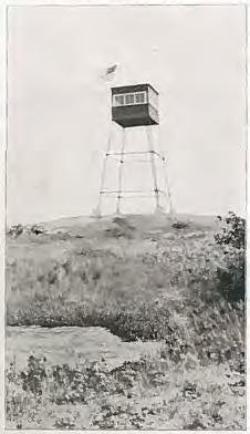 Blue Job Fire Tower, Farmington New Hampshire Original 1915 structure and cab on Blue Job Mountain shortly after construction (1916)