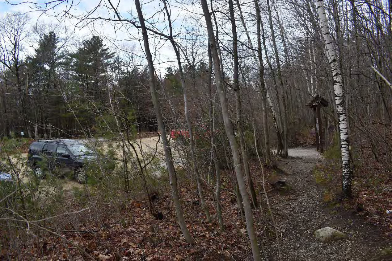 Blue Job Fire Tower, Farmington New Hampshire Trailhead and parking area, looking southwest from trail to fire tower (2022)