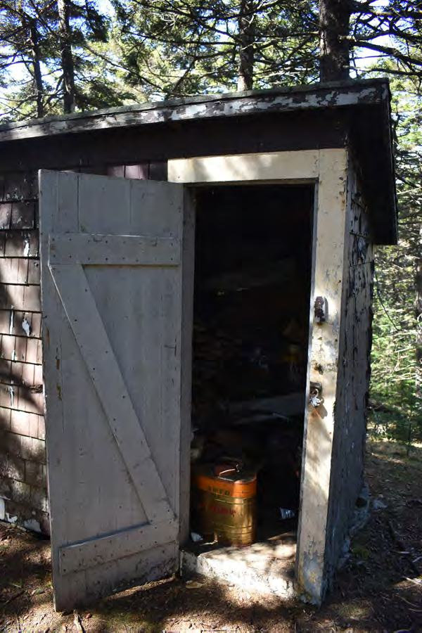 Belknap Mountain Fire Tower, Gilford New Hampshire Woodshed/Outhouse interior (2022)