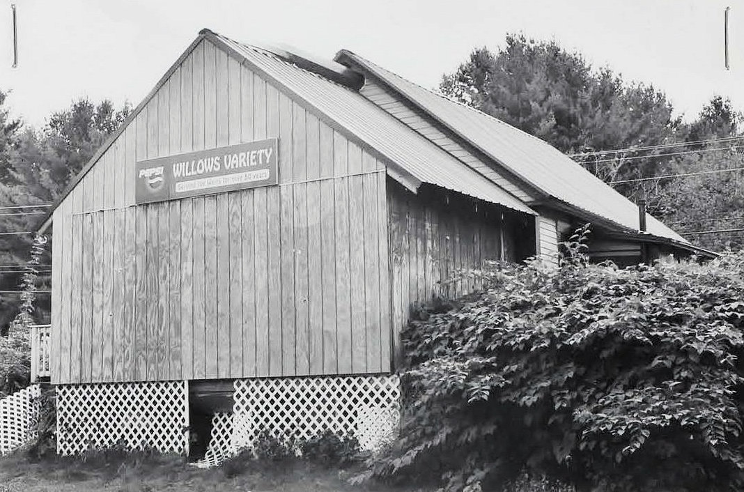 Weirs Highlands Camp and Cottages, Laconia New Hampshire Wilcomb House cooler and storage addition at rear and bathroom addition partially hidden by bushes (2006)
