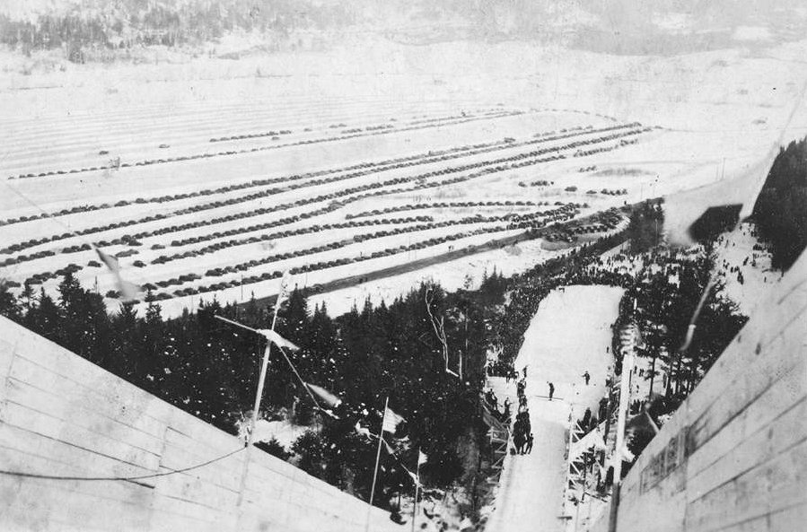 Nansen Ski Jump, Milan New Hampshire View from the top of the Nansen Ski Jump during the Eastern Elimination Contests for selecting the U.S. Olympic ski jumping team in March 1938. The event drew an estimated 25,000, many of whom came by automobile and parked in the airfield on the east side of Route 16 (1938)